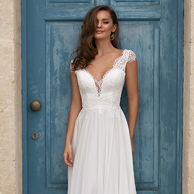 Lace Embroidered V-neck Sleeveless Brush Train Wedding Dress